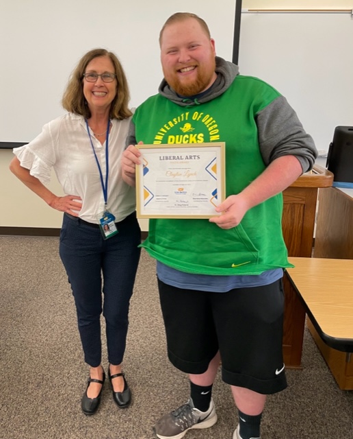 photo of Clayton Lynch receiving award